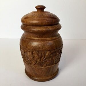 Small hand carved wood trinket jar.